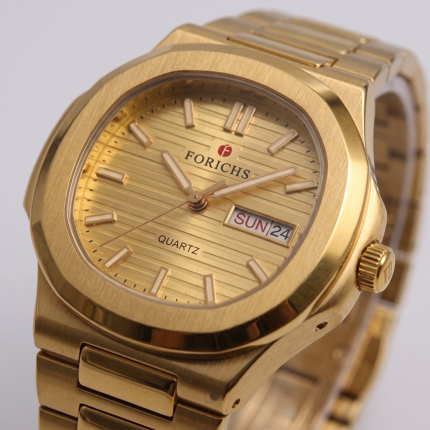 FORICHS full gold quartz watch with golden textured dial and day-date window, shown in close-up detail